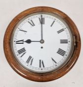 Oak cased circular wall clock, painted dial with roman numerals, single fusee movement, 30cm