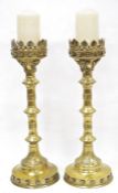 Pair large brass church-style candlesticks with raised foliate border, ornate decoration, on