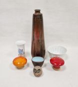 Bo Melander, Denmark, two pottery mushrooms, one decorated with a flower on red ground, the other