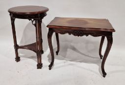 Mahogany circular occasional table with triple cluster column supports and concave sided under
