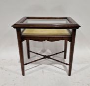20th century stained mahogany bijouterie table, of rectangular form, with glazed top and side