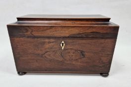 19th century rosewood sarcophagus-shaped tea caddy with two-compartment interior and mixing bowl,