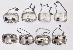 Selection of eight silver decanter labels
