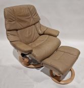 Ekornes Stressless reclining and revolving armchair with footstool, upholstered and covered in beige