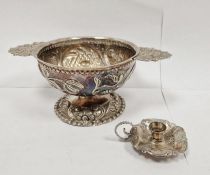 Continental white metal two-handled pedestal bowl, repousse decorated, marked indistinctly to the