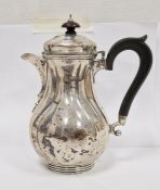 Late Victorian silver water jug, with ebony finial and handle, London 1893, maker Carrington & Co.