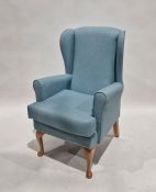 Reproduction Georgian-style wing armchair in blue weave fabric