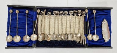 Set of eight silver-coloured metal teaspoons and two similar forks with elephant finials,