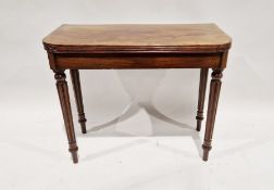 19th century mahogany tea table on reeded supports, 74cm high x 94cm wide x 43cm deep
