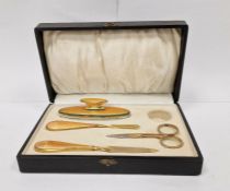 Gilt-coloured metal and orange enamel manicure set in fitted box