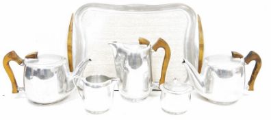Vintage Picquotware tea set comprising tray (43cm wide), two teapots, hot water jug, cream jug and
