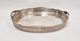 Silver-plated two-handled oval tray with pierced sides, 52cm x 36cm