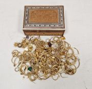 Quantity of assorted gold-coloured jewellery, mainly earrings, in wooden box