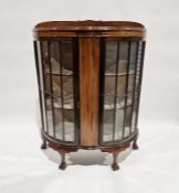 Early 20th century mahogany bowfronted display cabinet with pair of astragal glazed doors