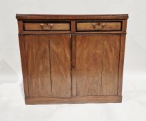 19th century walnut veneered and ebonised linenpress with two drawers above pair of panel