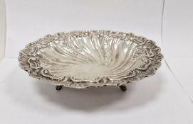 Continental silver-coloured circular bowl, on three scroll feet, unmarked, 21cm in diameter, 5cm