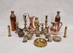 Large assortment of brass and copper ware to include an ornate pair of candlesticks with fleur de