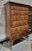 Early 18th century walnut chest on stand, the top with cavetto cornice, three short drawers above
