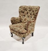 Button back easy armchair in trailing floral brocade, on stump cabriole supports