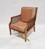 Early 20th century square-back bergere single cane armchair with damask loose cushions, on square