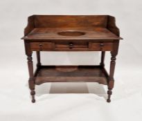 Victorian mahogany wash stand, with galleried top, two short frieze drawers over a fitted under