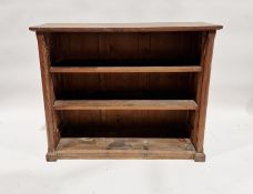 Stained pine bookcase of three shelves, 92cm high x 114cm wide x 39cm deep