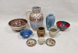 Rockwood Pottery vase with floral decoration on blue ground, impressed mark to base, height 18cm,