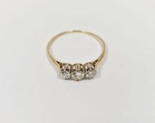 Gold and diamond three-stone ring (band worn), in Connard & Sons fitted box, 1.7g
