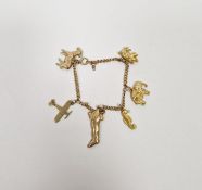 Fine gold-coloured metal charm bracelet with some gold and some gold-plated charms