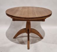 Modern oak extending dining table, of oval form, with single additional leaf, measuring