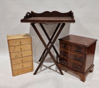 Oak butlers tray and stand, a reproduction serpentine-fronted chest of three drawers, 59cm high