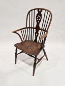 LOT WITHDRAWN Late Georgian Windsor wheelback armchair on turned baluster supports with H-