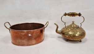 Twin-handled copper pot of oval form and a single-handled teapot, the handle with a coloured grip,