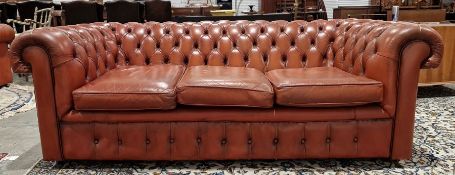 Brown leatherette Chesterfield three-seater sofaCondition ReportLight surface scratches and marks,