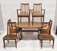 G-Plan teak dining suite viz:- oval extending dining table on end standard supports and set of six