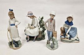 Four various Nao porcelain figures and groups of children (4)