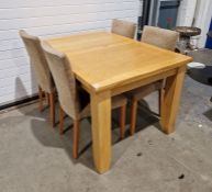 Modern extending oak dining table, possibly from Oak Furniture Land, of rectangular form, 76cm