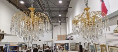 Pair of 20th century chandeliers, each having an array of cut glass hanging droplets