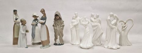 Four Nao porcelain figures, each depicting a boy or girl with animal, five porcelain groups