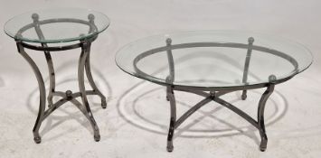 Contemporary glass-topped metal coffee table of oval form, a similar occasional table of circular