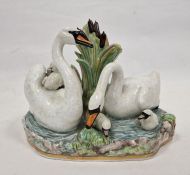 Late 19th century Meissen group of swans amongst bullrushes, blue crossed swords marks, incised 'G.