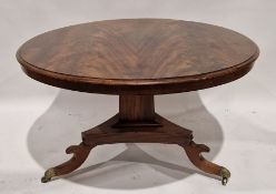 Regency mahogany tilt-top breakfast table of circular form, raised on a tripod base with hipped