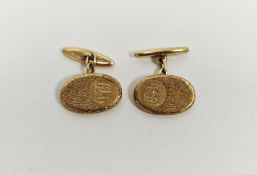 Pair of gentleman's 9ct gold cufflinks, of oval form with bark effect decoration, engraved