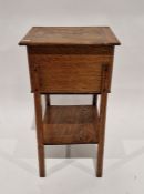 Early 20th century oak sewing box, the lid opening to reveal two removable trays, raised on