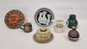 Collection of studio pottery, a Delft plate and other items including a Sun Pottery wall plaque, a