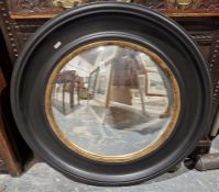 Large modern convex wall mirror mounted in a baroque frame, 74cm diameter