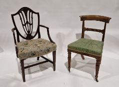 Late 19th/early 20th century mahogany armchair with shield back, raised on square tapering front
