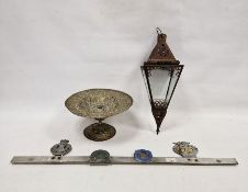 Brass tazza with everted rim, allover sunflower, insect and other floral repousse, on knopped