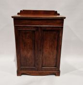 Victorian mahogany cabinet having one drawer raised above a two door cupboard, the cupboard