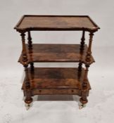 19th century burr walnut three-tier whatnot, raised over a single long drawer, on original ceramic